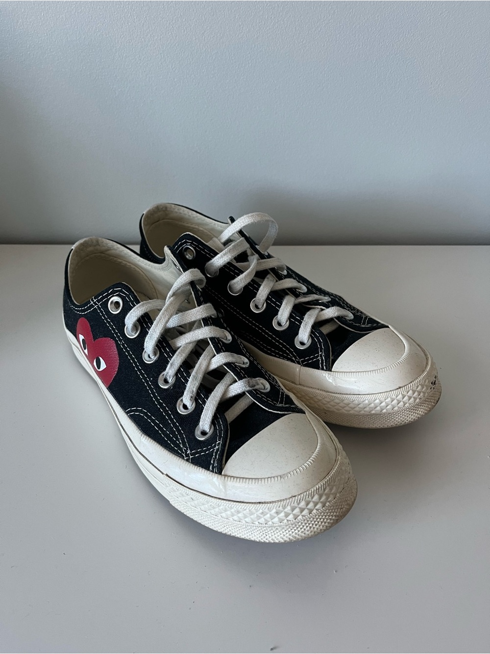Comme des garçons black with red heart low top converse